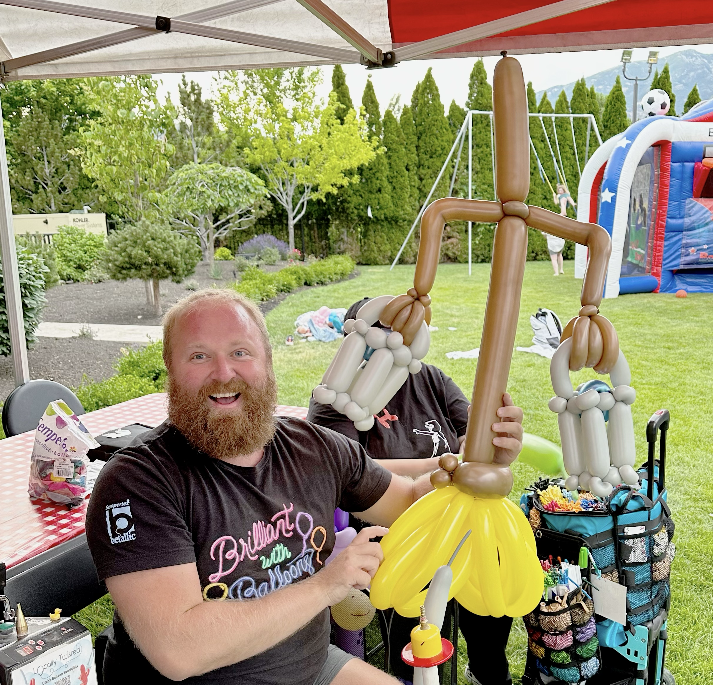 Balloon broom sculpture made for an event guest
