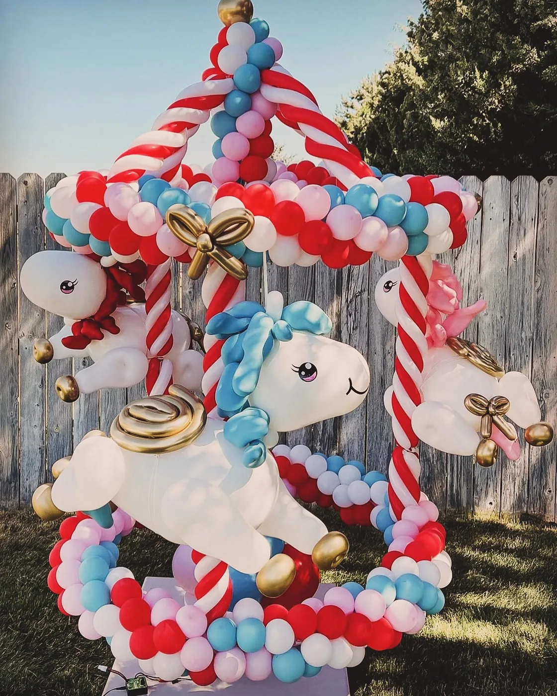 Carousel-themed decor for a private celebration