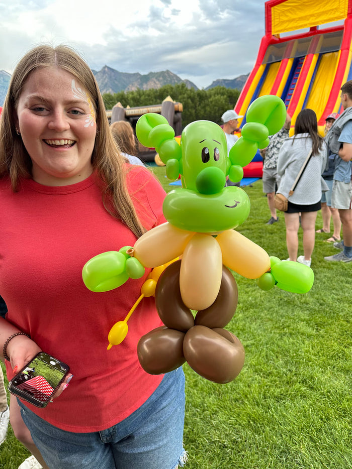 Large balloon twisting creation with multiple shaped balloons
