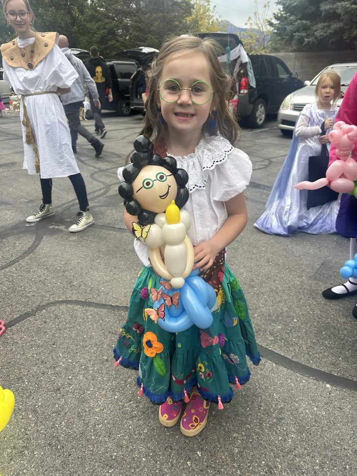 Balloon twisting example with a Mirabel-inspired character