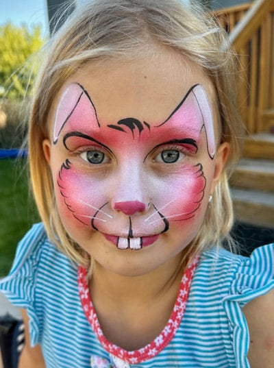 Detailed cheek art face painting example